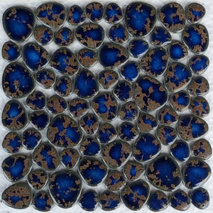 A grill w/ these Terra Blue Pebble tiles is being built- 50% deposit